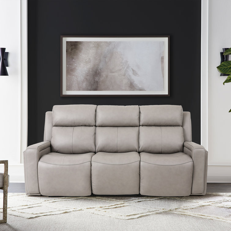 Reclining sofa with lumbar clearance support